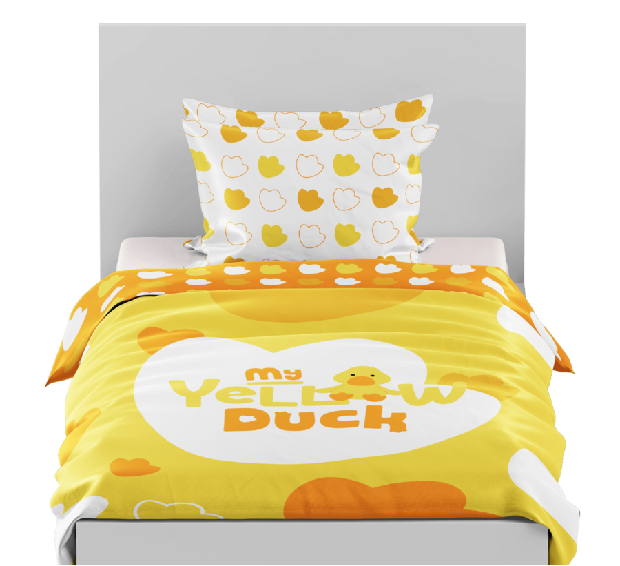 Yellow duck comforter and pillow set on a bed
